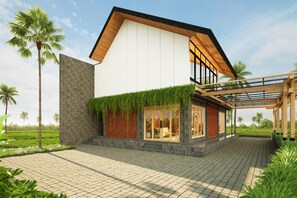 A modern house with a flat roof, large windows, and a covered porch.