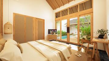 A bedroom with a bed, a television, and a view of a swimming pool.