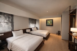 A hotel room with two beds, a wooden headboard, a nightstand, a bedside table, a lamp, a painting on the wall, and a small wooden stool. - Cloudscape Apartment (Chengdu)
