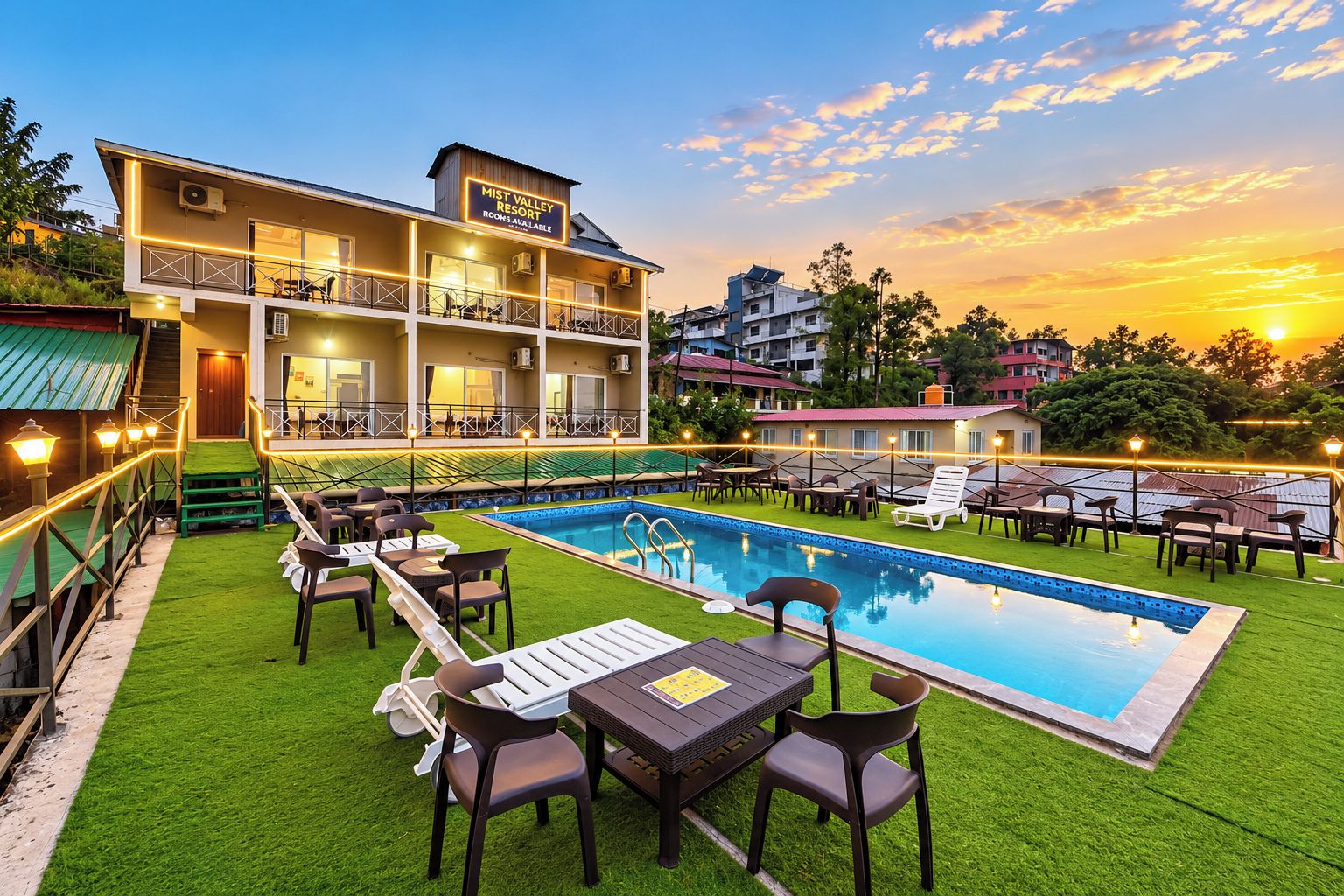 A resort with a swimming pool, outdoor seating, and a building with a sign indicating available rooms.