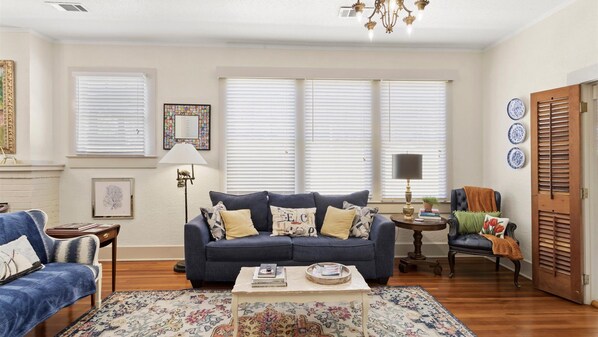 Get cozy on this plush sofa! - Hopkins House. 3 BR, Pet-Friendly, Historic Charm, Local Art, Beach, Fenced Yard & Downtown Biloxi (Biloxi)