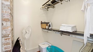 In the closet, you'll find an iron, plenty of hangers, a dog bed, extra towels, and more.  - Hopkins House. 3 BR, Pet-Friendly, Historic Charm, Local Art, Beach, Fenced Yard & Downtown Biloxi (Biloxi)