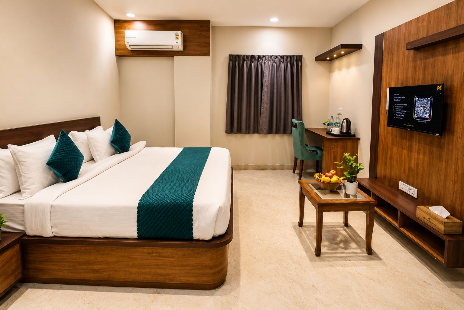 A hotel room with a bed, a desk, a chair, a TV, and an air conditioning unit.