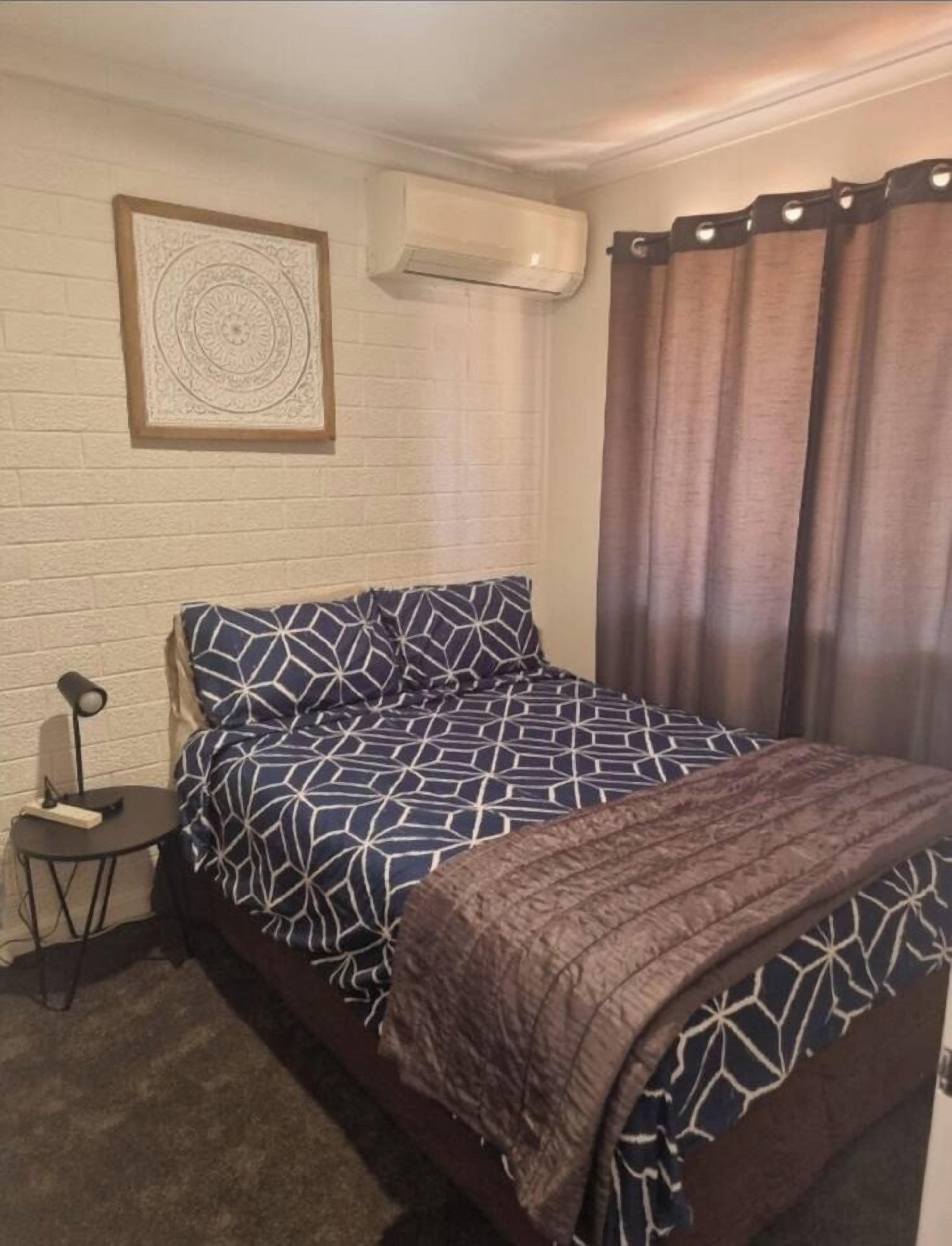 room, indoor, climate control, bed, private space.