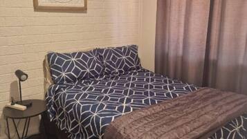 room, indoor, climate control, bed, private space.