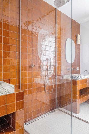 A modern bathroom with a glass-enclosed shower, a large mirror, and a dual sink vanity. - Exceptional Duplex - Ac-4br/8p- Close to Marais (Paris)