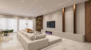 A modern living room with a sectional sofa, a flat-screen TV mounted on the wall, a fireplace, and a dining area with a table and chairs. - 15BR house sleeps 15 with spa and pool table (Kissimmee)