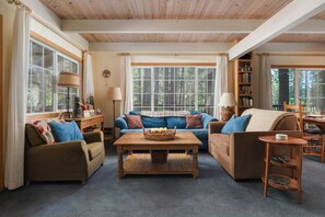 Living room with plenty of light, board games, and TV - Sleeps 12 | 3 Baths | Hot Tub | Near Bear Valley (Arnold)