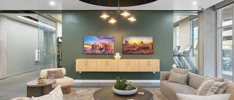 Modern designer lounge with cozy seating and bright, upscale style