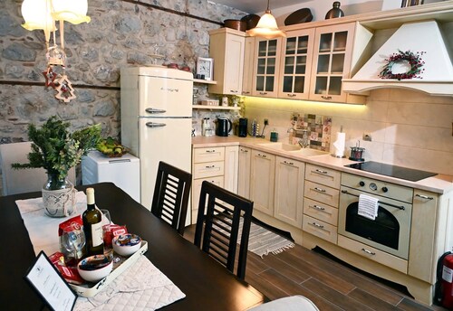Lithora | Arachova · Stone Home with Fireplace