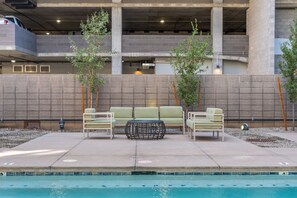Relax poolside with comfy lounge seating and a modern patio retreat - Lovely 2BR | Pool + W/D | Near Arts District (Phoenix)