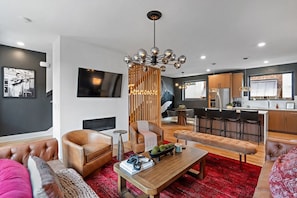 Spacious, open floor plan. Living Room with Smart TV - Unwind in Opulence 4BR 4BA Near Bway! (Nashville)