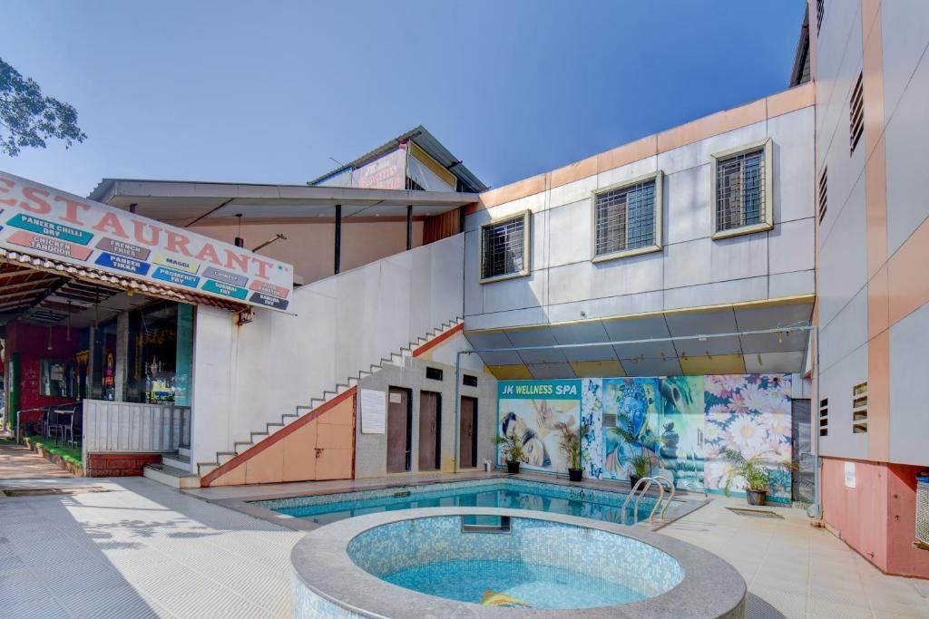 A building with a swimming pool, a restaurant, and a spa.