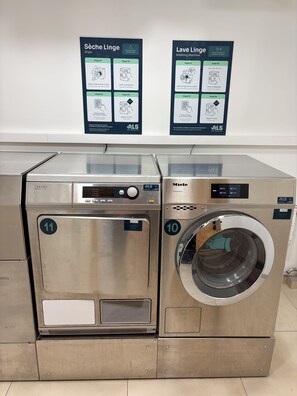 Two stainless steel front-loading washing machines, model numbers 11 and 10, with control panels and digital displays. - La Source - Duplex - Sleeps 6 - Pool. (Saint-Gervais-les-Bains)