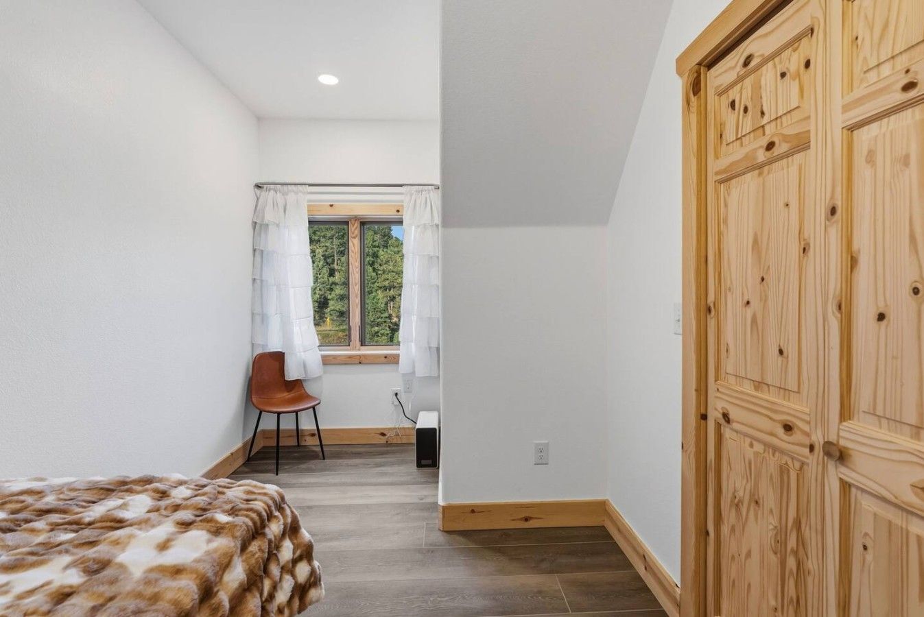 Bedroom 6: One full bed with access to shared bathroom
