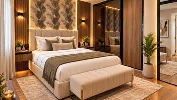 Een moderne slaapkamer met een groot bed, nachtkastjes, een bankje en een kroonluchter.
