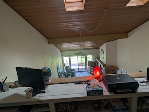 An office space with a desk, computer, and various office supplies. - 2-bedroom condo in Flagstaff at Continental Country club. (Flagstaff)