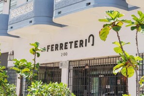 A building facade with the name 'FERRETERIN' and the number '200' indicating a hotel or establishment. - Apt with Terrace near Beaches & Old San Juan-15 (San Juan)