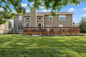 A two-story residential building with a deck in front. - The Westfield Retreat | 7 Bedrooms • 30+ Day Stays (Westfield)