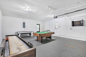 A room with a pool table, a billiards table, and a dartboard. - Private Pool • Sleeps 16 • Huge Yard • AC GameRoom (Lakeland)
