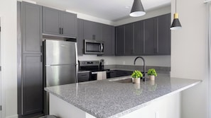Private kitchen - Landing | Modern 2BD, Pool, Gym (Mission Bend)