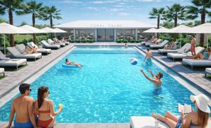 A pool area with lounge chairs, a swimming pool, and a building labeled 'CORAL PALMS'. - Landing | Spectacular 3BD, Pool, Clubhouse (Jacksonville)