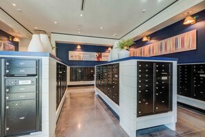 A U.S. Mail collection area with mailboxes numbered 237 to 48P. - Landing | Modern 2BD, Pool (Tampa)