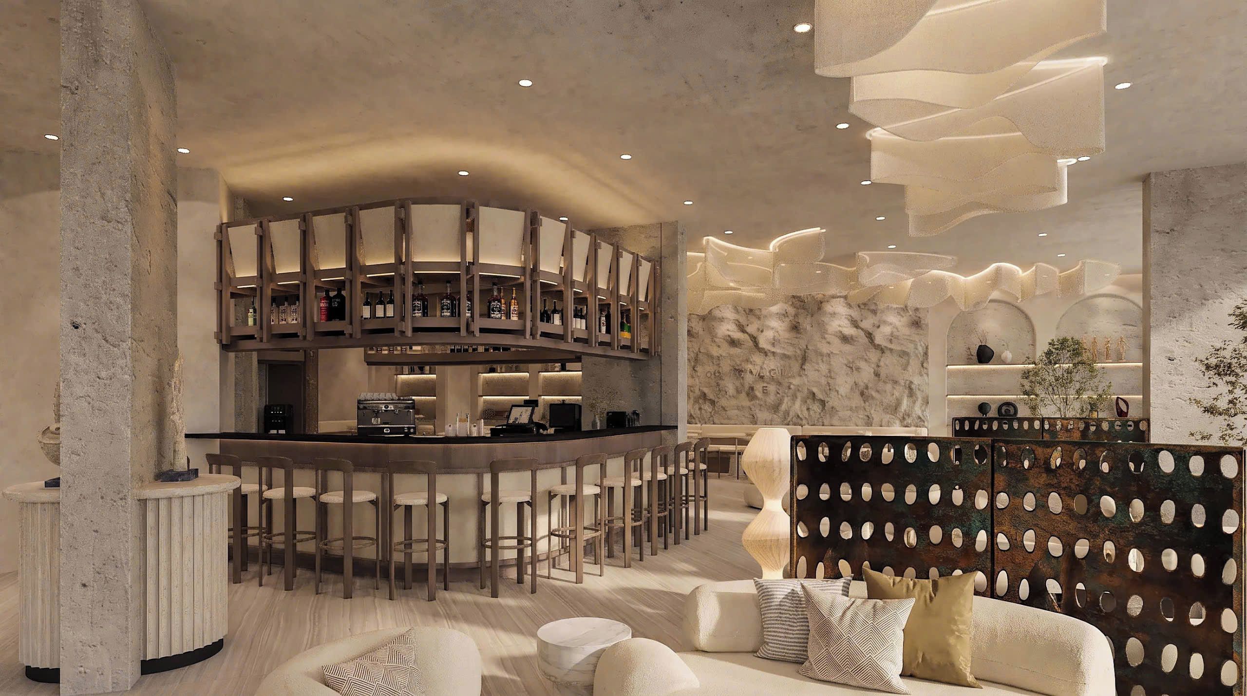 A modern interior with a bar area, seating, and a decorative wall.