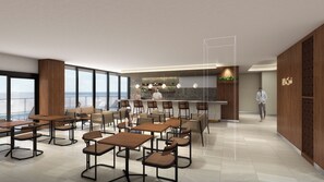 Un ristorante moderno con zona bar, posti a sedere e vista sul mare.