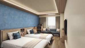 Habitación de hotel con dos camas, un sofá, un televisor y una ventana con cortinas.