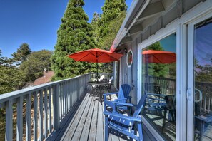 Lounge the day away or dine alfresco with stunning views on the upper deck​ - Lake View Cabin Game Room (Crestline)