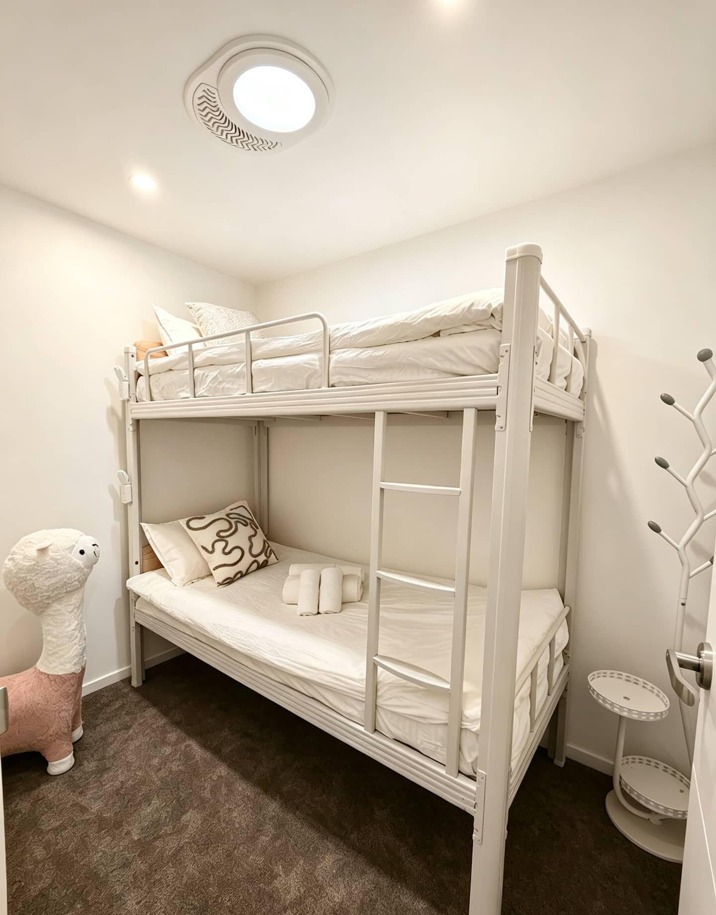 A fun little hideaway for younger travellers — bunk beds give the kids their own cozy space to settle into.