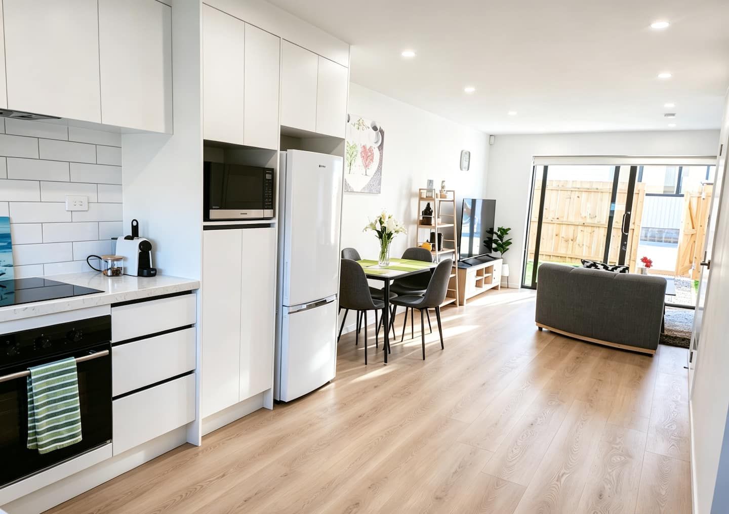 A spacious open-plan layout keeps everyone connected, whether you’re cooking, eating, or simply relaxing together.
