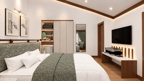 A modern hotel room with a large bed, a flat-screen TV, a desk with a computer, and a walk-in closet. - The Cove Hotels And Resorts  (Srinagar)