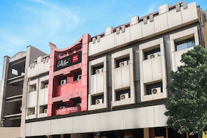 A hotel building with a prominent sign for 'Collection Hotel Prestige' and multiple balconies. - Super Capital O Prestige (Hyderabad)