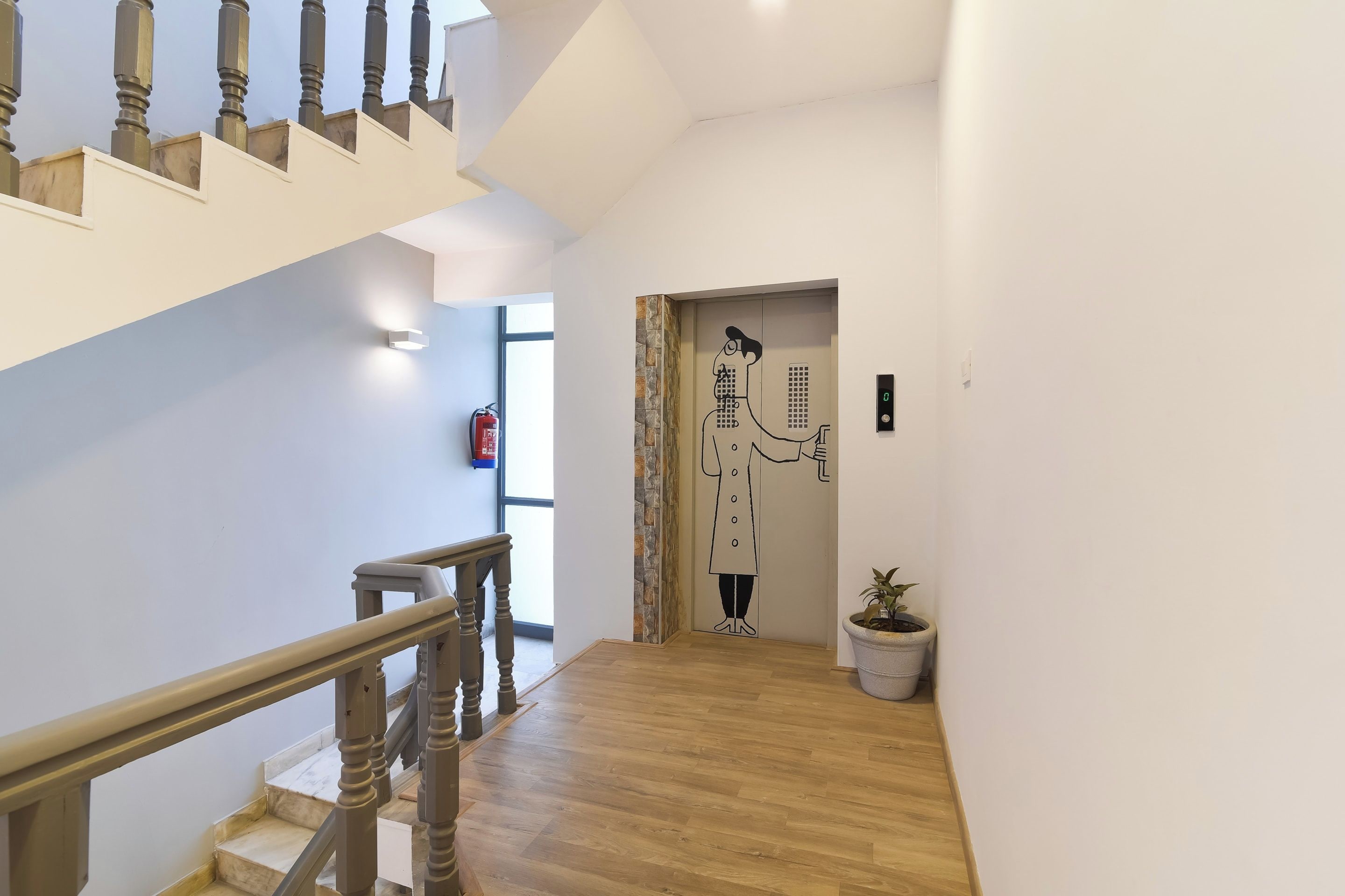 A staircase with wooden balusters leading to a landing.