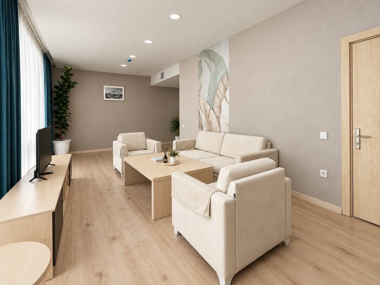 A modern living room with a sofa set, a coffee table, and a TV.