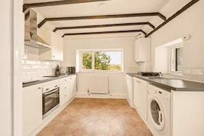 The well-equipped kitchen has modern appliances and ample worktops - Hillside Cottage - North East Escapes (East Ord)