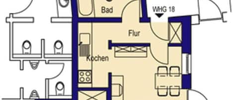 A hotel floor plan with a kitchen, dining area, living room, and bathroom.
