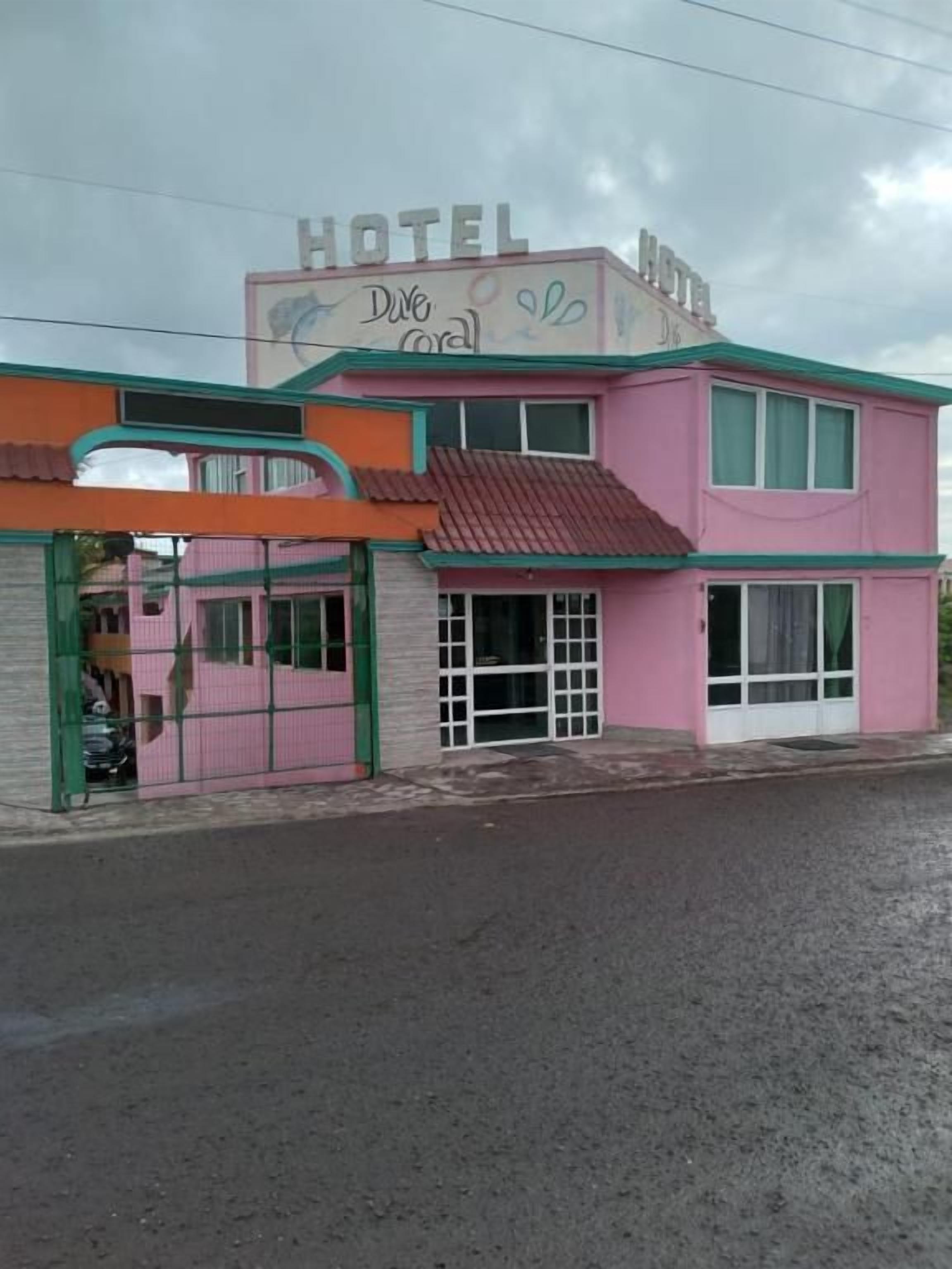 A two-story building with a sign that reads "HOTEL".