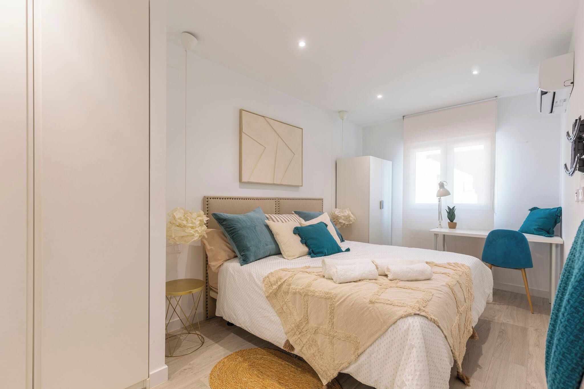 Master bedroom with a work desk