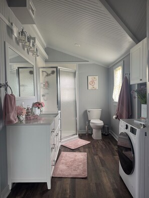 Downstairs bathroom.  Fully stocked with toiletries and washer/dryer. - Serene 1880's farmhouse near Round Top (Fayetteville)
