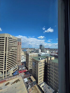 A high-rise building with multiple floors, large windows, and a flat roof. - Cozy 16th-Floor Downtown Loft | City Views | Steps to ICE District (Edmonton)