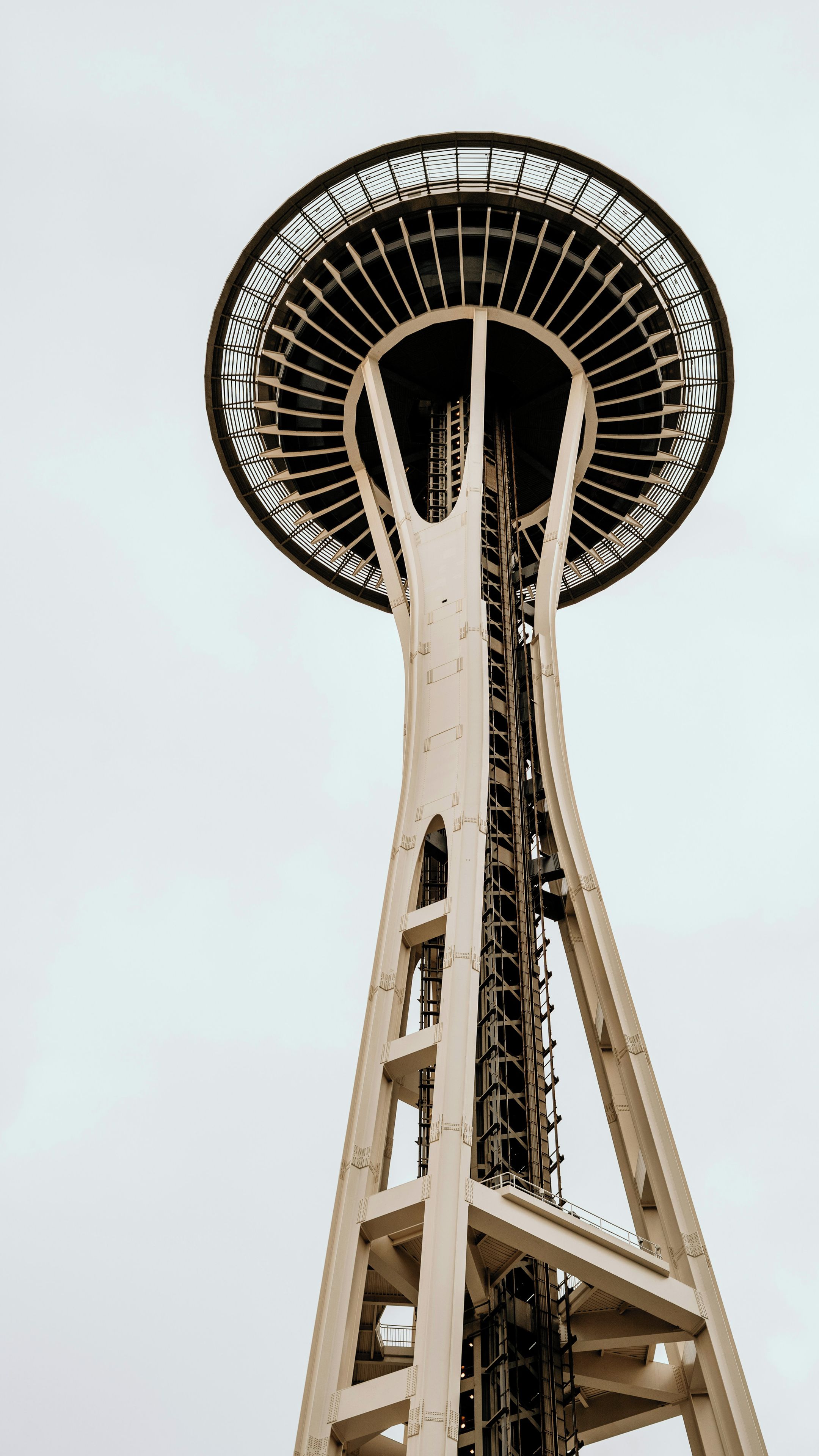 A tall tower with a large circular observation deck at the top.