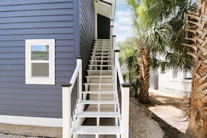 A staircase leading to a house with a window on the side. - Walk to St Augustine | Fully Renovated Luxury Home (St. Augustine)