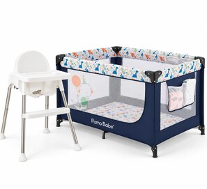 A baby crib with a mesh side and a white chair. - The Napa Luxe Brand-New 2BR/2BA Sleeps 6. (Napa)
