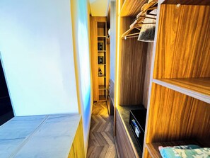 A hallway with wooden shelving and a herringbone-patterned floor. - 10% Off Weekly Stay, Hammam, Heated Pool, Sleeps 12, Amelkis Golf, Marrakech (Marrakech)