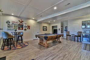 A room with a pool table, bar stools, a pool, and a refrigerator. - Glorious Views 5-bedroom house in perfect Black Mountain (Black Mountain)