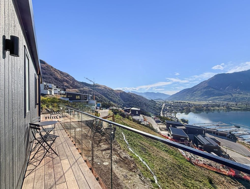 Take in the beautiful Queenstown landscape from the property's outdoor walkway.