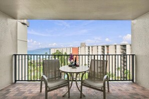 Step outside to enjoy the ocean breeze and beautiful coastal scenery from the lanai. - Kaanapali Sunset Escape with Ocean Views (Lahaina)